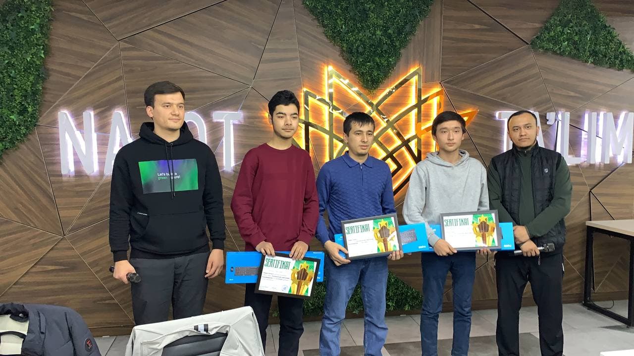 Me and my team winning a hackathon at Najot Ta'lim